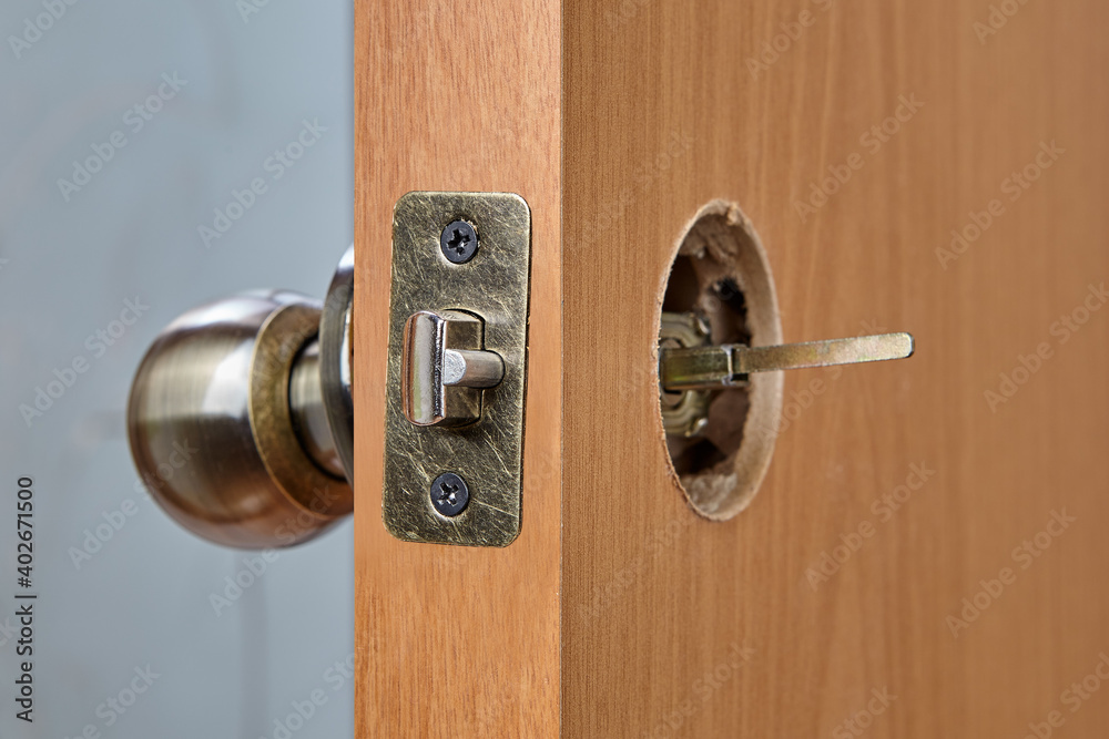 The spindle of the knob mechanism is visible from the back of door. The spindle of the knob mechanism is visible from the back of door.