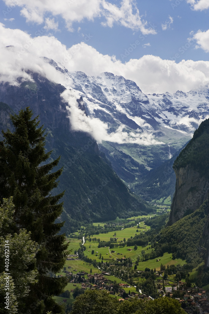 The spectacular Lauterbrunnen valley with the Lauterbrunnen Wall blocking the head of the valley, Bernese Oberland, Switzerland, from Wengwald