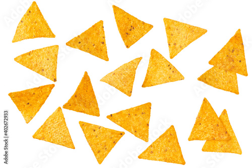 Collection of various corn tortilla chips or nachos isolated on a white background.