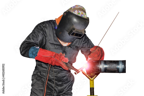 Welder is welding Tungsten Inert Gas welding, TIG welding process on metal steel pipe isolated on white background