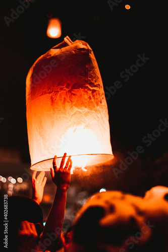 person holding a lantern
