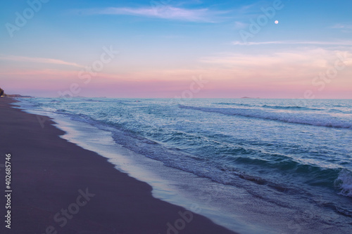 Beautiful twilight sea in sunset with pastel sky