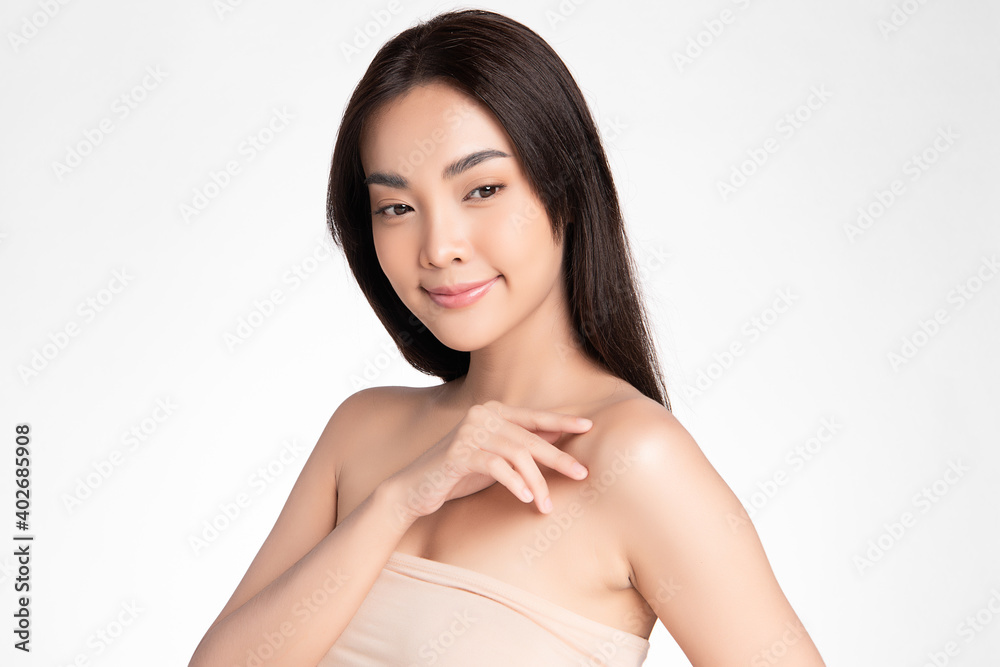 Beautiful Young asian Woman with Clean Fresh Skin, on Pink background, Face care, Facial treatment. Cosmetology, beauty and spa. Asian women portrait Beautiful Young asian Woman with Clean Fresh Skin, on Pink background, Face care, Facial treatment. Cosmetology, beauty and spa. Asian women portrait