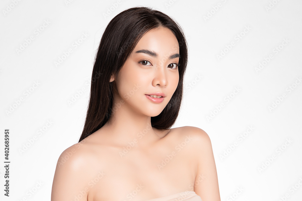 Beautiful Young asian Woman with Clean Fresh Skin, on Pink background, Face care, Facial treatment. Cosmetology, beauty and spa. Asian women portrait Beautiful Young asian Woman with Clean Fresh Skin, on Pink background, Face care, Facial treatment. Cosmetology, beauty and spa. Asian women portrait
