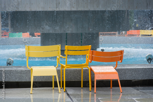 Colorful wet chairs, next to Dizengoff Square Fountain, Tel aviv, Israel photo