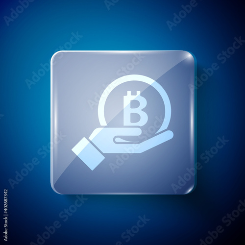 White Hand holding Bitcoin icon isolated on blue background. Blockchain technology, digital money market, cryptocoin wallet. Square glass panels. Vector.