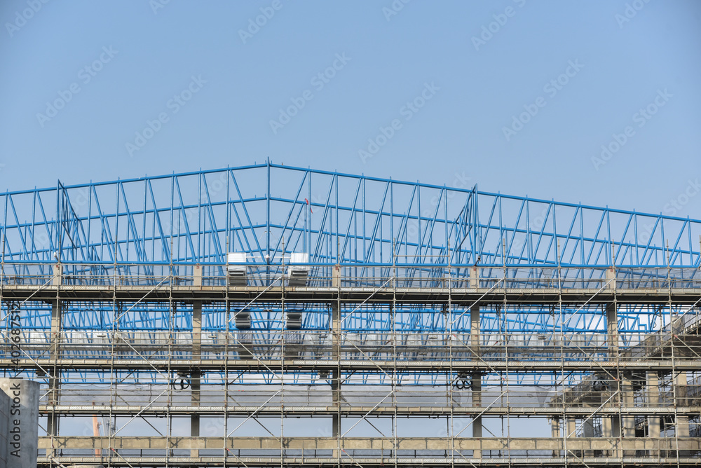 Construction site with scaffolding Steel structure.