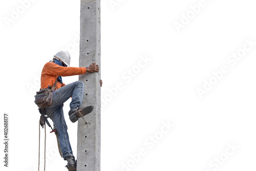 Worker on hight Electric lineman repairman worker with safety belt at climbing work on electric post power pole Isolated on white background.
