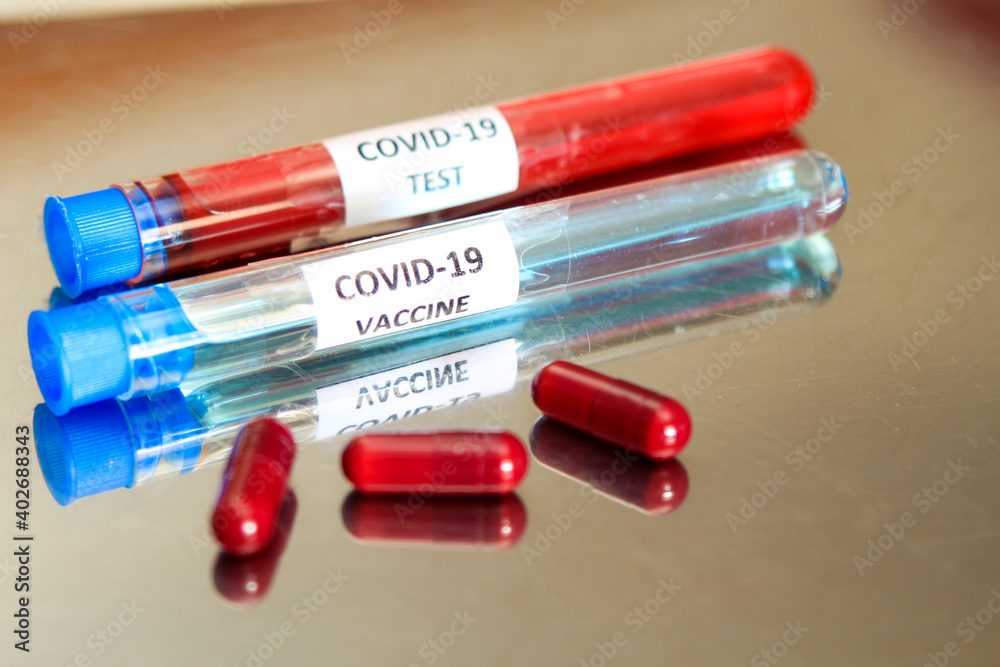 Test tubes with blood and Covid-19 vaccine Stock Photo | Adobe Stock