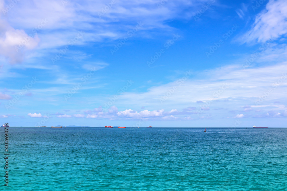 Blue Sea and blue sky with Container ship minimal of cargo ship in the sea minimal style. Blue Sea and blue sky with Container ship minimal of cargo ship in the sea minimal style.