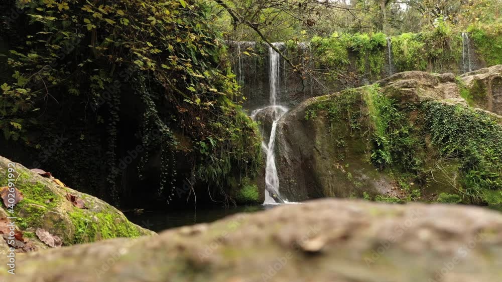 waterfall in la garrotxa. beautiful waterfall in the middle of nature waterfall in la garrotxa. beautiful waterfall in the middle of nature