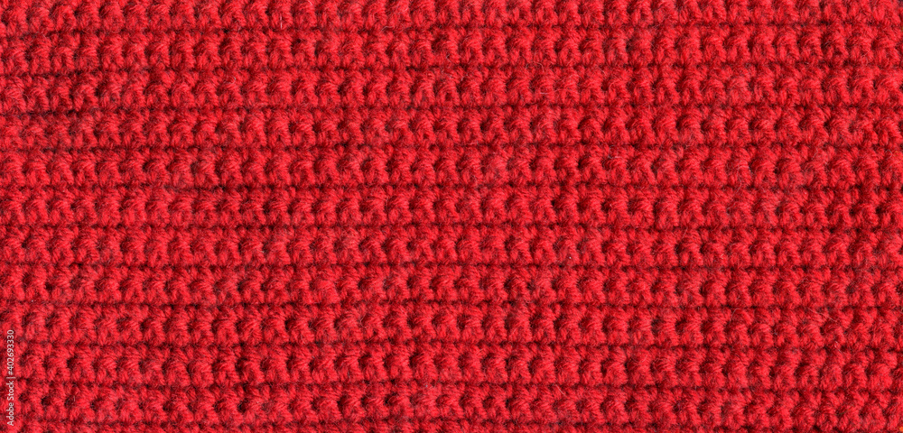 texture of crocheted red canvas with a simple pattern texture of crocheted red canvas with a simple pattern