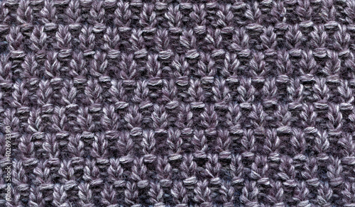simple knitted woolen fabric pattern, knitting. warm cozy background