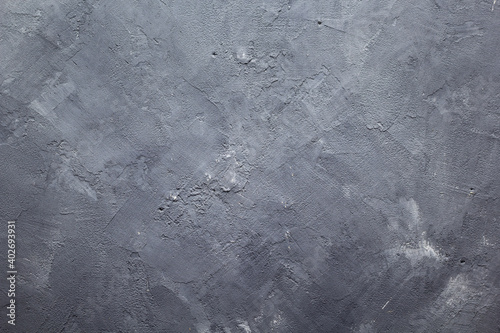 abstract painted stone or putty surface of wall background texture photo