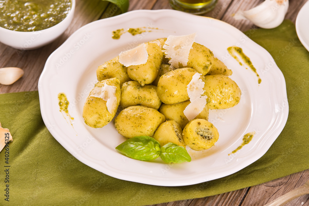 Potato gnocchi stuffed with pesto sauce.
Potato gnocchi stuffed with pesto sauce.
