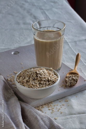 Oatmeal face and oatmeal on a light background.