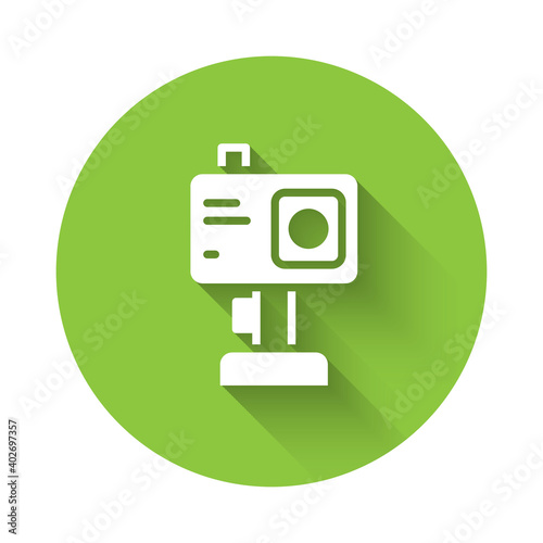 White Action extreme camera icon isolated with long shadow. Video camera equipment for filming extreme sports. Green circle button. Vector.