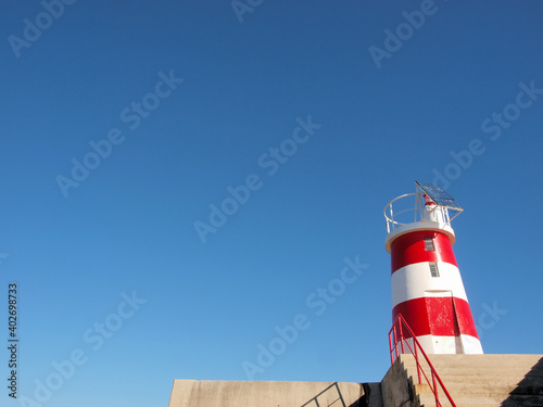 Red / White lighttower in Sagres, Westalgarve - Portugal  photo