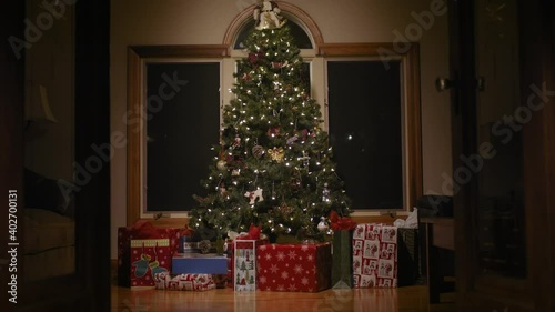 The night before christmas. Christmas tree and presents. Christmas eve night. Waiting for Santa and family. Holiday spirity. photo