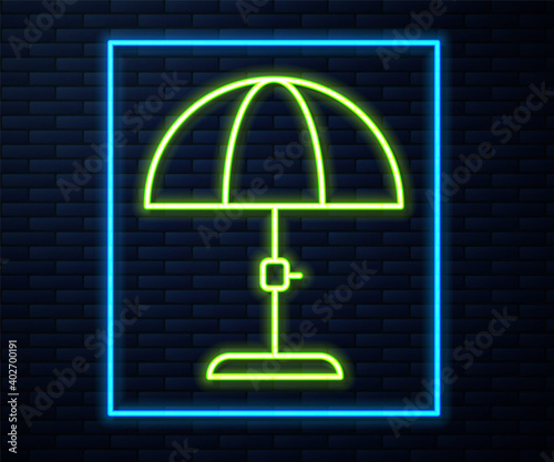 Glowing neon line Sun protective umbrella for beach icon isolated on brick wall background. Large parasol for outdoor space. Beach umbrella. Vector.