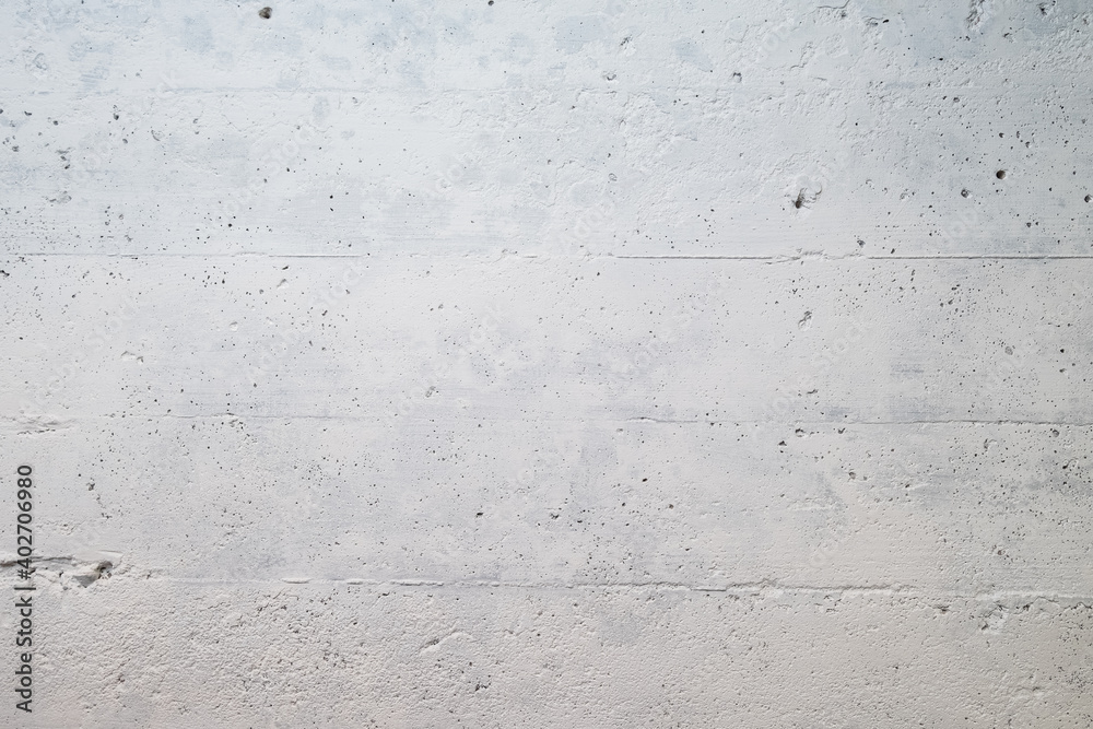 Photograph of a concrete wall in a basement painted gray Photograph of a concrete wall in a basement painted gray
