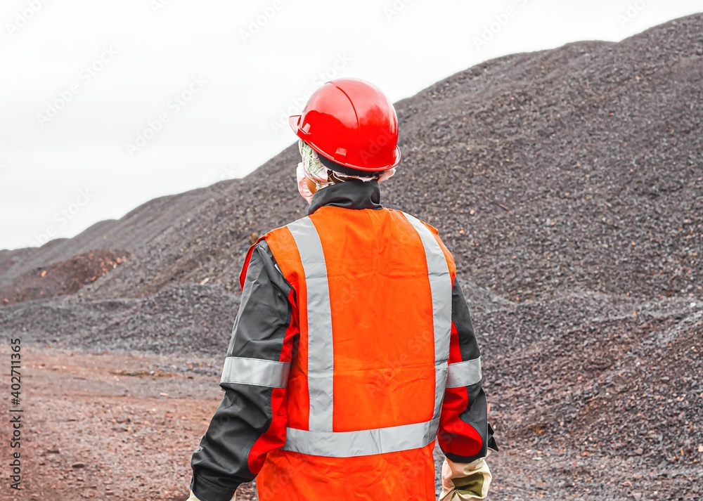 A helmet for protection of the head . Mining industry. A vest with a reflective strip. Labor protection