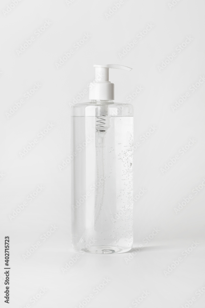 Micellar water bottle on a light background.. Micellar water bottle on a light background..