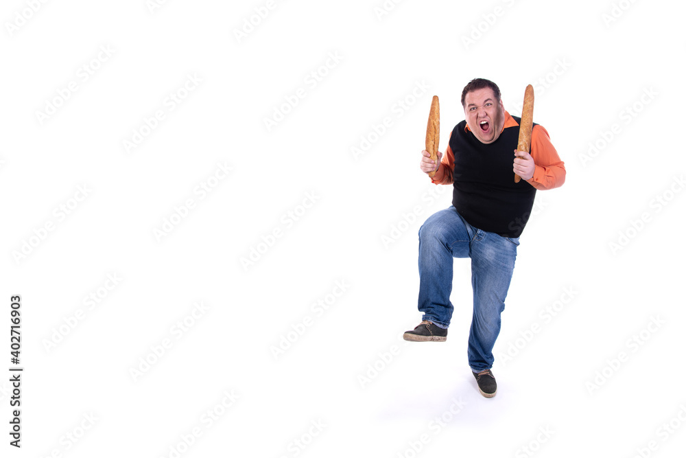 Funny fat guy on a diet. Happy man with baguettes. White background. Funny fat guy on a diet. Happy man with baguettes. White background.