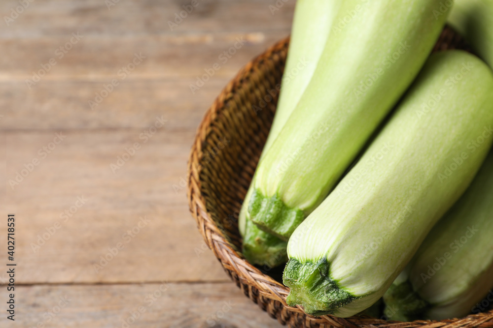 Ripe zucchinis on wooden table, closeup. Space for text Ripe zucchinis on wooden table, closeup. Space for text