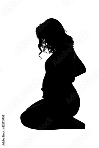 Silhouette of a pregnant woman. Isolated on white background. Vertical.
