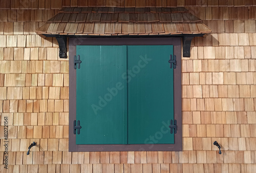 Old wooden window with shut...