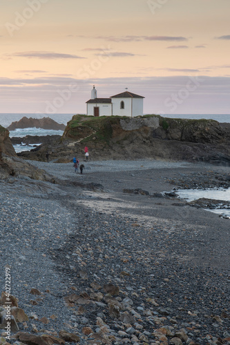 Vertical shot of Virxe do Porto hermitage. Valdoviño, Galicia, Spain photo