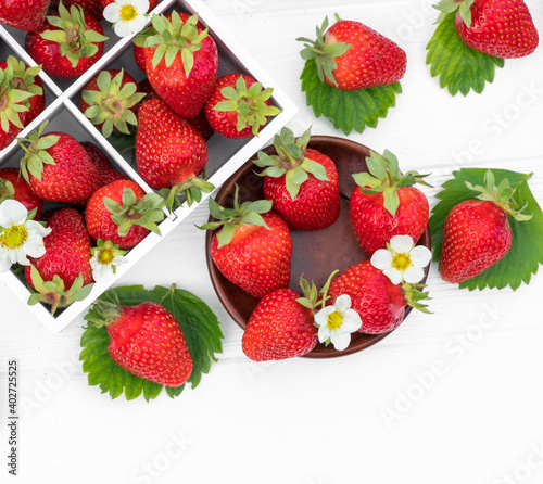 Fresh strawberries in a white wooden box