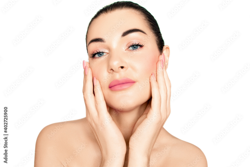 Girl's face on a white background. Hands near the face. A gentle smile..