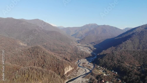 Aerial View Drone Flight Over Fantastic Canyon Mountain River Dramatic Autumn Nature Landscape Green Meadows Orange Hills Pine Tree Forests. 4k