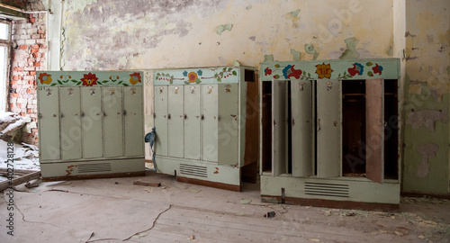 Empty kindergarten room in former military base abandoned after regime collapse