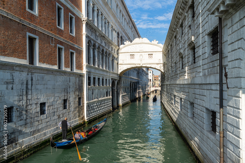 VENICE, ITALY - 07 November 2015: Image with Gondolas at Bridge oh Sights in Venice. Ponte dei Sospiri, medieval mediterranean landmark of Italy