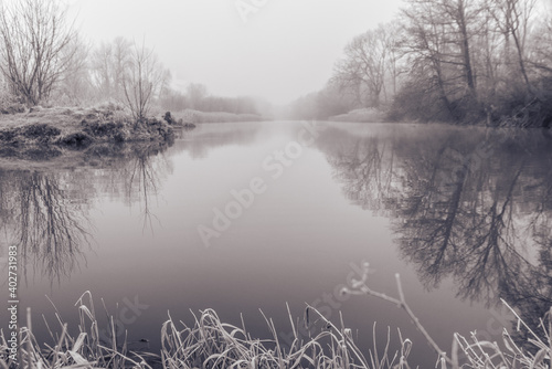 Lake in mist in black and white