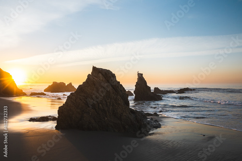 Sunrise at rocky El Matador Beach in Malibu, California
