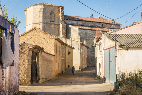 San Juan street passing by the church in Castrillo Mota de Judios village, province of Burgos, Castile and Leon, Spain