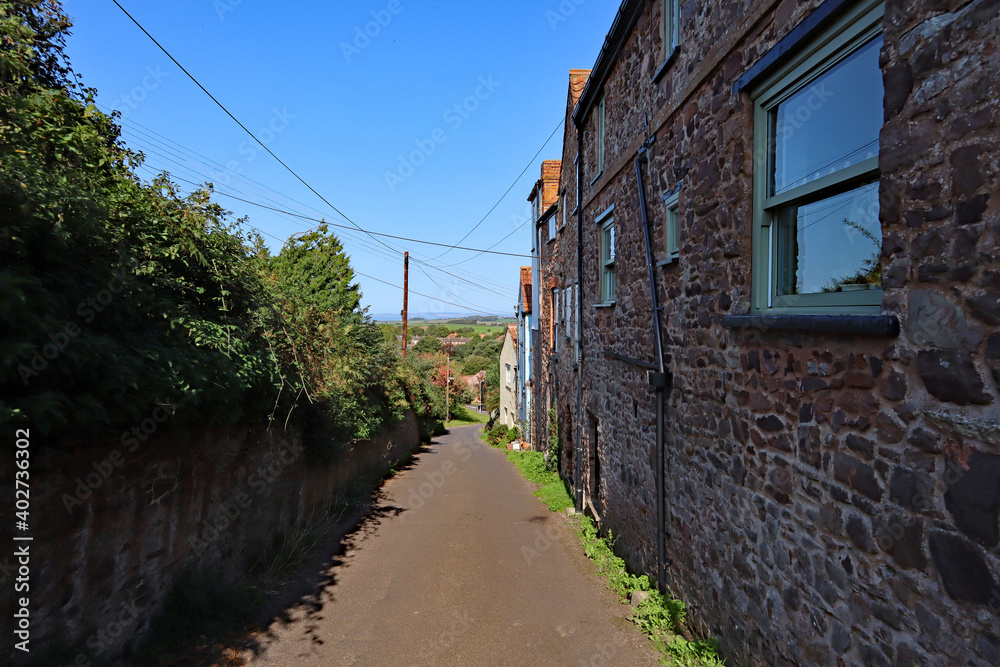 A narrow country lane in Nether Stowey in Somerset, England