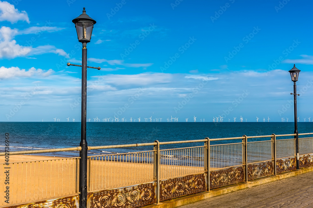 The view from Skegness pier, UK out towards the wind farm on the horizon in summertime