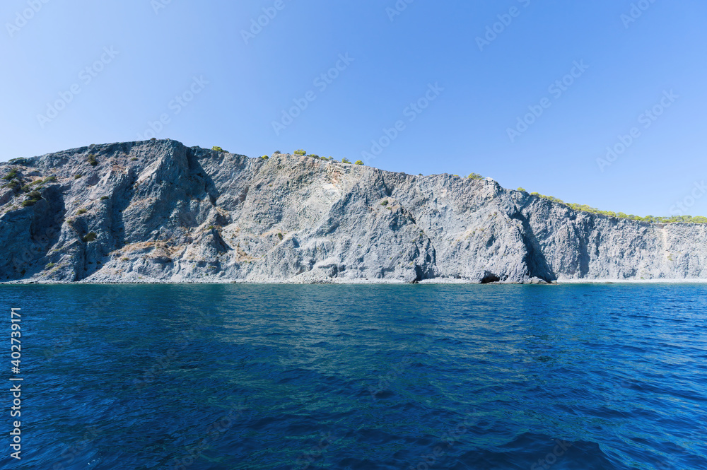 The wild coast of Aegina island in Saronic gulf, Aegean See, Greece