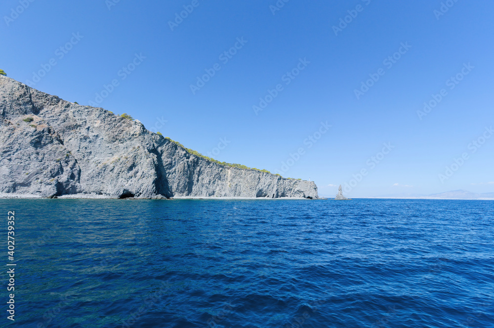 The wild coast of Aegina island in Saronic gulf, Aegean See, Greece