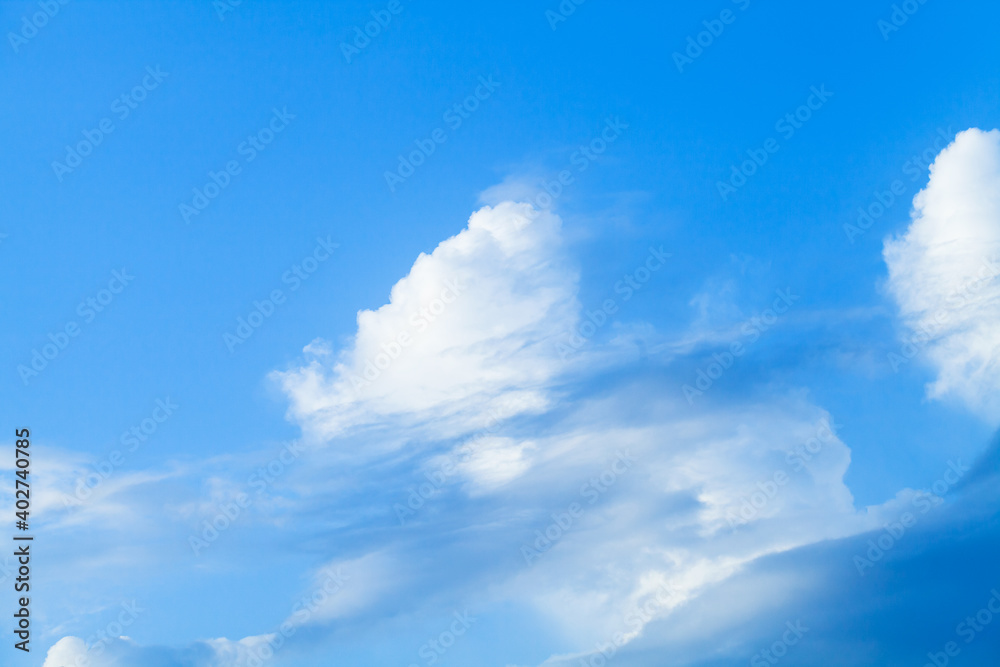 White clouds in blue sky at daytime. Background photo White clouds in blue sky at daytime. Background photo