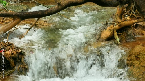 A small stream in the mountains 4K photo