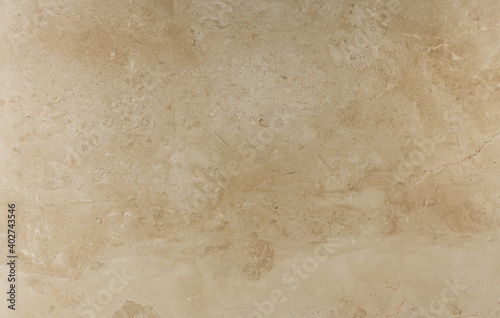 Light beige exquisite Crema Nova marble. The texture of natural stone. Building materials for interior decoration.