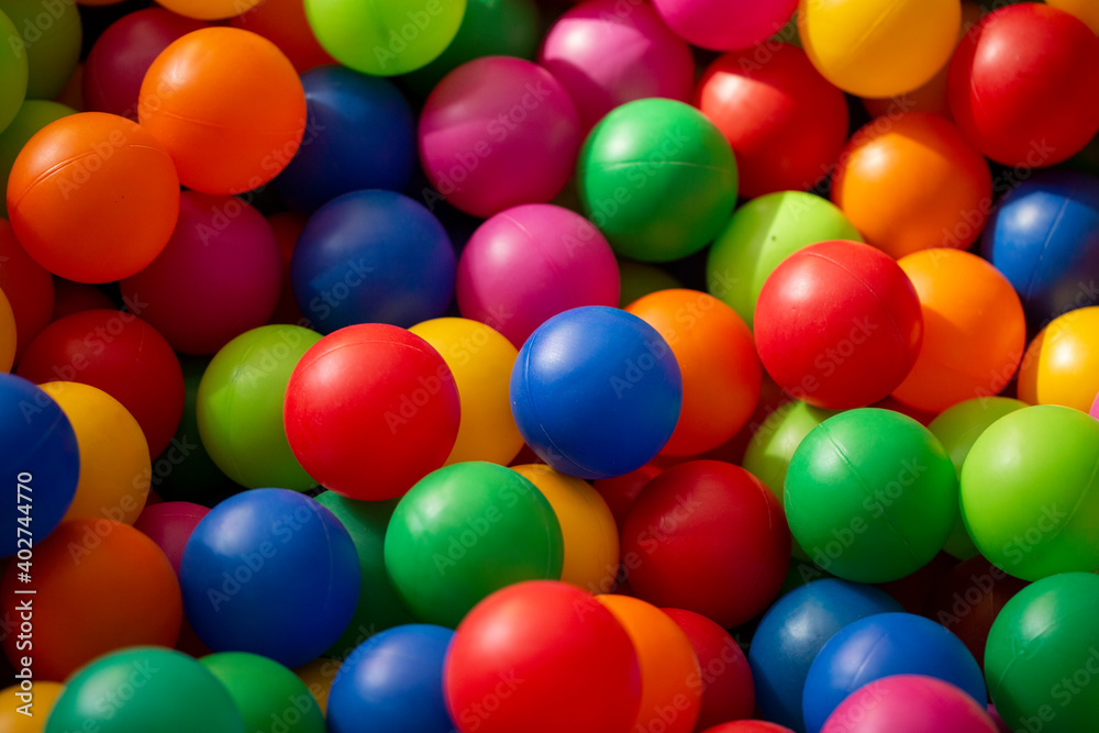 background of a heap of colored plastic balls in the playground background of a heap of colored plastic balls in the playground