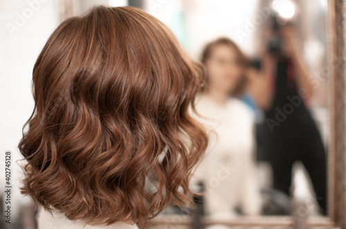 Beautiful wavy hair styling on a young woman