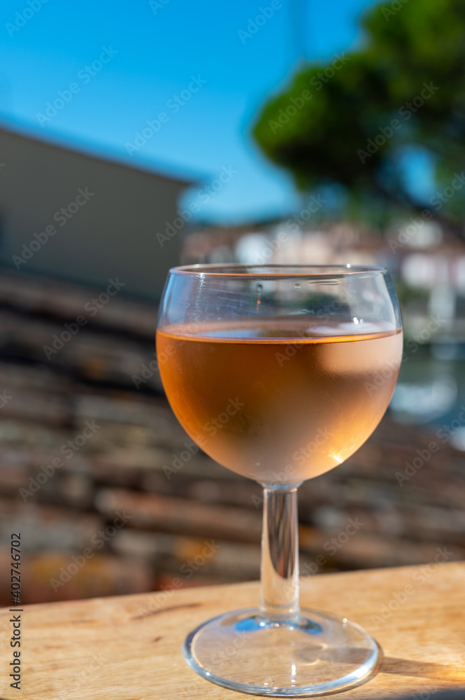 Drinking of local rose wine in summer Provence, France Drinking of local rose wine in summer Provence, France